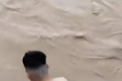 Watch This Young Man's Epic Leap from a Bridge into a Raging River!