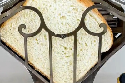 Retro Marvel: The Fascinating 1920s Toaster in Action!